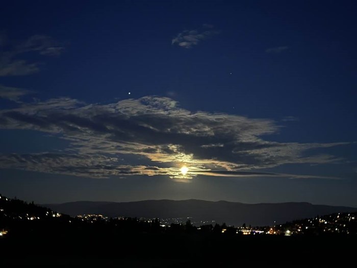 The full Hunter's Moon shone brightly in mostly clear skies over Kelowna. 