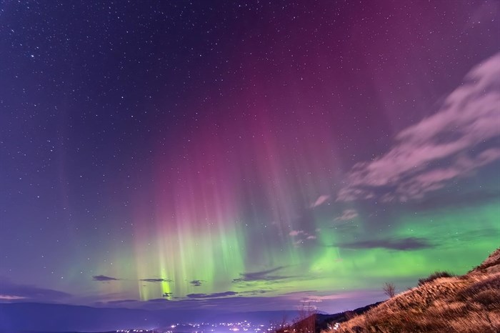 The Northern Lights are seen shimmering over Vernon in this photograph taken by Richard Hues.