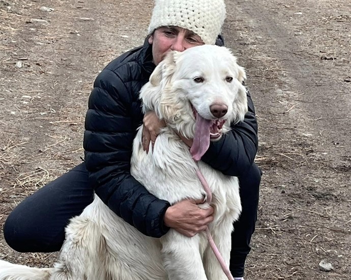 Penticton resident Meredith Essler is shown reuniting with a dog that was missing for 3.5 months. 