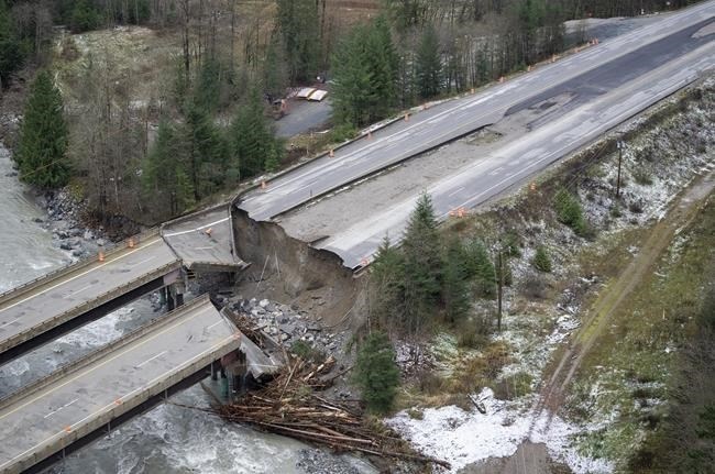 British Columbia's transportation minister says 130 kilometres of highway destroyed by flooding two years ago has been rebuilt to be more resilient to extreme weather. Damage caused by heavy rains and mudslides is pictured along the Coquihalla Highway near Hope, B.C., Thursday, Nov. 18, 2021.