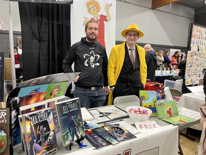 Nate Bennett on the left and Matthew Senn on the right at their booth at Comic-Con. Senn was dressed as comic book detective Dick Tracy.