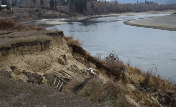Robertson's lawn chair rests in the silt after falling with the rest of the landslide.