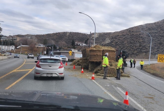 A truck tipped over near the Valleyview interchange, spilling its load of hay on Nov. 28, 2023.