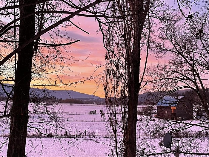 Sunrise, snow and a barn are seen in this photo taken in the Shuswap. 