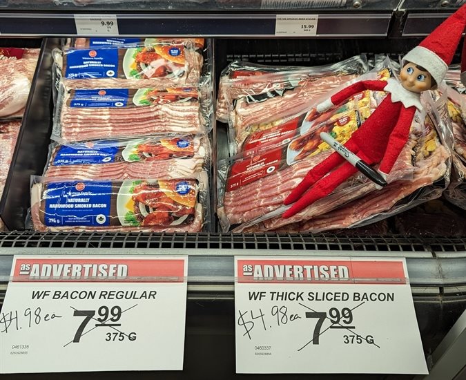 This elf slashes prices at the Village Grocer in the Shuswap. 