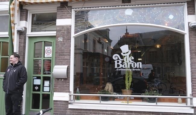 The entrance of coffeeshop De Baron in the southern Dutch city of Breda, after Health Minister Ernst Kuipers visited to launch a new policy on pot growing in two Dutch cities, Friday, Dec. 15, 2023. A paradox at the heart of the Netherlands' permissive pot policy went up in smoke Friday in two Dutch cities as “coffeeshops” began selling the country's first legally cultivated cannabis as part of an experiment to regulate the trade.