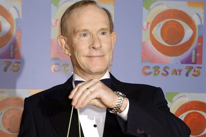 FILE - Tom Smothers does yo-yo tricks during arrivals at CBS's 75th anniversary celebration Sunday, Nov. 2, 2003, in New York. Tom Smothers, half of the Smother Brothers and the co-host of one of the most socially conscious and groundbreaking television shows in the history of the medium, has died, Tuesday, Dec. 26, 2023 at 86. 