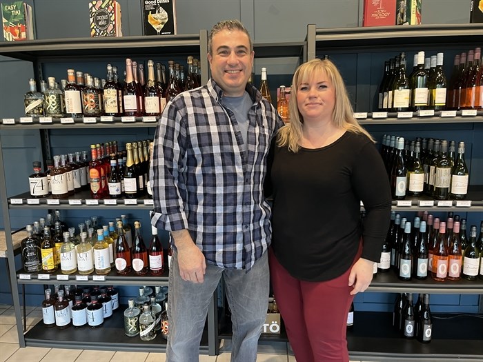 Joey Ippolito (left) and Lindsay Brochu stand in front a wide variety of non alcoholic beers, wine and spirits at their new store in Kamloops called Mocktail Mixery.