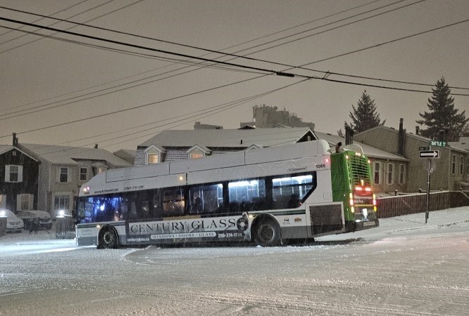 A BC Transit bus attempting to cross 1 Avenue slid the wrong way down the steep hill.