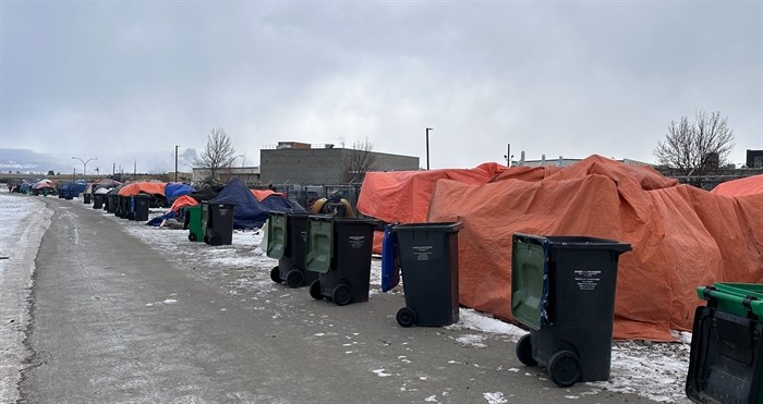 Rows of tents line the Rail Trail during deadly freezing temperatures. 