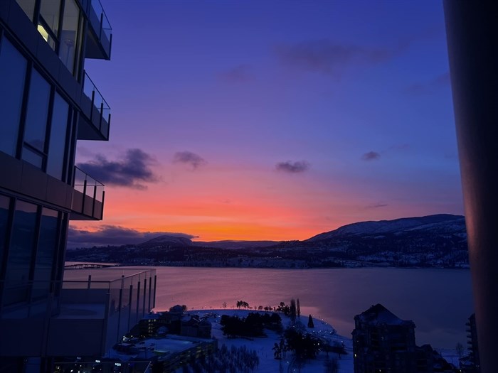 This moody view shows the sun setting over Okanagan Lake in Kelowna. 