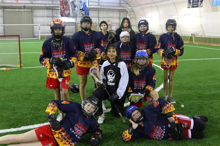 Meadow Arcand-Squakin coached at a practice game with the next generation of female lacrosse players from the Penticton Heat team.