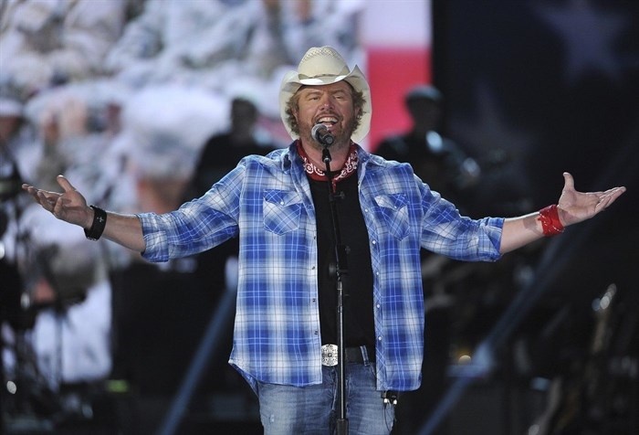 FILE - In this April 7, 2014, file photo shows Toby Keith performs at ACM Presents an All-Star Salute to the Troops in Las Vegas. “Beer For My Horses” singer-songwriter Toby Keith has died. He was 62. Keith passed peacefully on Monday, Feb. 5, 2024 surrounded by his family, according to a statement posted on the country singer's website.