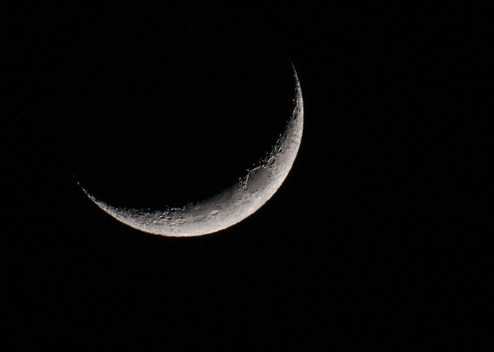 The craters on the crescent moon can be seen in this photo taken in Kamloops. 