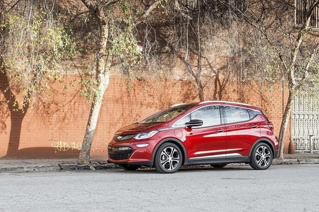 This photo provided by Edmunds shows a 2017 Chevrolet Bolt EV. There are upsides to purchasing a used electric vehicle such as fuel savings and taking advantage of an available federal tax credit of up to $4,000. 