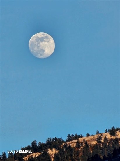 This full Snow moon was captured before night fall over Mt. Peter and Mt. Paul in Kamloops. 