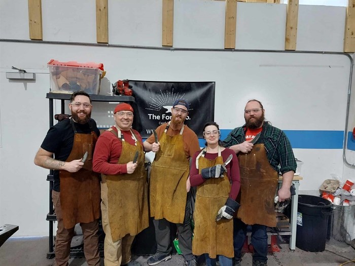 Students after a knife making class at Leonard's workshop.