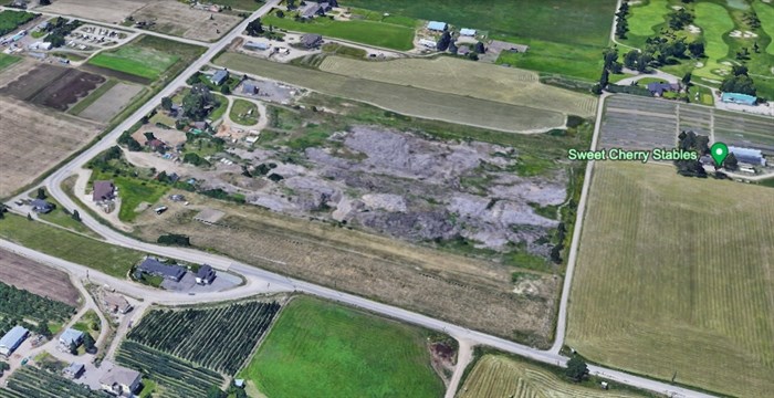 This Google Earth view shows the four properties. The one at the bottom and at the top are in agricultural use. 1040 and 982 Old Vernon Rd. are the ones in the middle showing the gray piles stacked on them.
