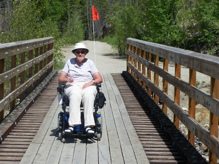 Patricia Richards travelling on a KVR trestle in her wheelchair.