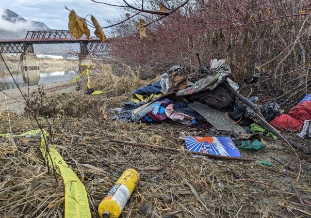 Debris from Hart's camp was piled in a heap on Feb. 3, 2024, after police cleared the scene. Much of the pile was not burned.