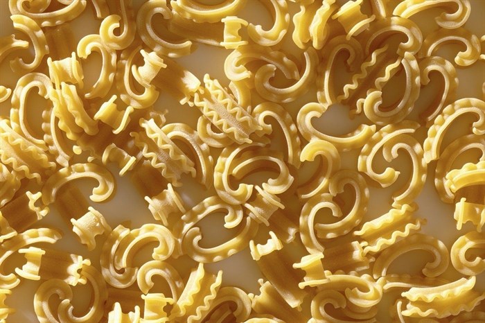 This image shows a new pasta shape called cascatelli, created by food writer and podcaster Dan Pashman. Pashman's “Anything's Pastable” features dishes using 34 different pasta shapes, but especially features his cascatelli, a graceful, ruffled-edged curved shape that resembles a quotation mark. Time magazine declared cascatelli one of 2021’s best inventions. 