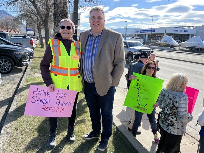 The organizer for a rally in Kamloops for pension reform, Celeste Fummerton (left) with BC United MLA Peter Milobar. 