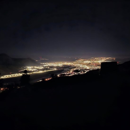 The lights of the city of Kamloops are pictured glowing at night.  