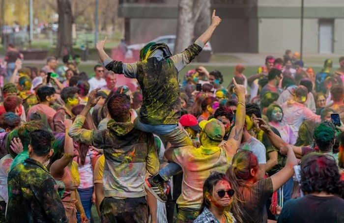 Participants are seen having fun at Holi Festival in Kamloops. 