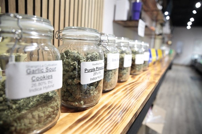 FILE - Jars of marijuana line a shelf at The Flower Shop Dispensary in Sioux Falls, S.D. on Oct. 14, 2022. Advocates of legalizing recreational marijuana, a mission with a rocky history in South Dakota, submitted thousands of signatures to election officials on Tuesday, May 7, 2024, in the hopes of once again getting the issue on the conservative state's November ballot.