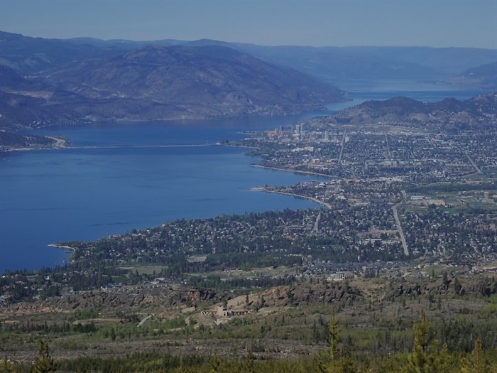 The city of Kelowna can be viewed from the Chute Lake Myra Canyon Rail Trail. 