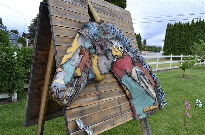 A metal horse head sculpture by Daren Williams on sale at one of the participating homes.