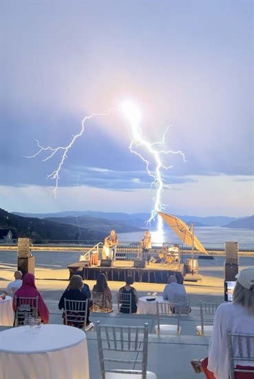 Lightning strikes at a Jim Cuddy & Barney Bentall concert at O'Rourke Family Estate in Lake Country. 
