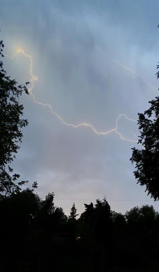 Lightning forks through the sky in Lake Country. 