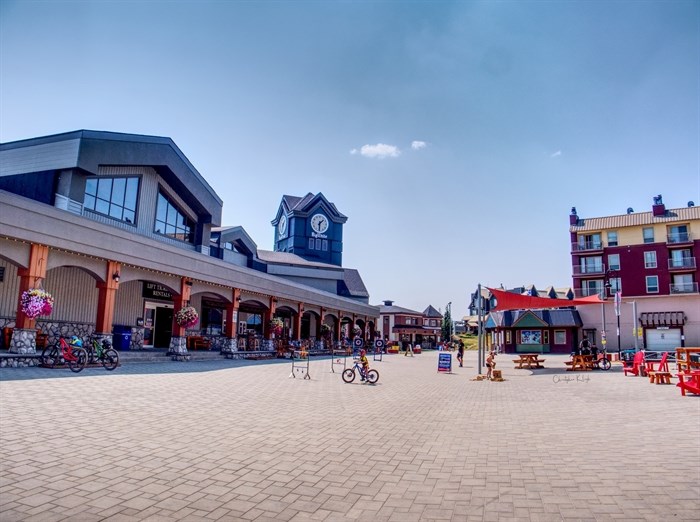 The Plaza is the main gathering place offering bars, restaurants and bike rentals at Big White Ski Resort. 