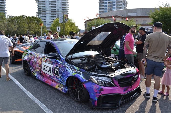 A Mercedes Benz with graphic decals and the hood popped at the Okanagan Dream Rally on July 27, 2024. 