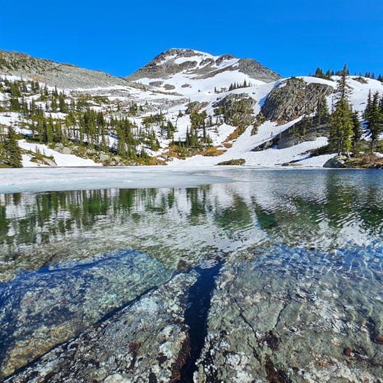 One of the Twin Lakes located east of Vernon is pictured with melting ice in July. 