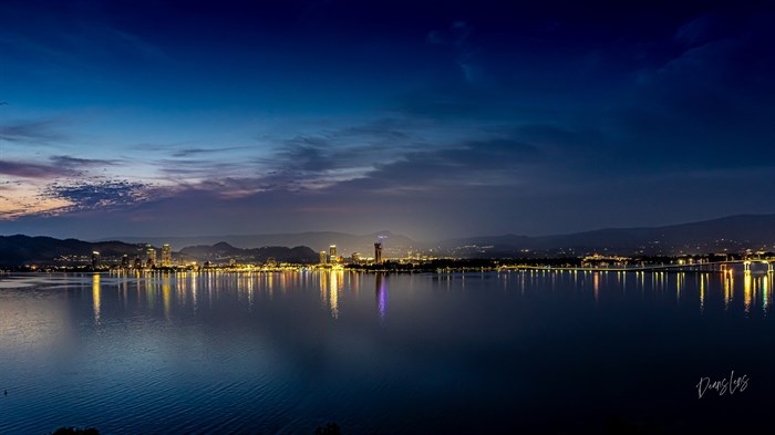 The night sky is reflected on Okanagan Lake in Kelowna.