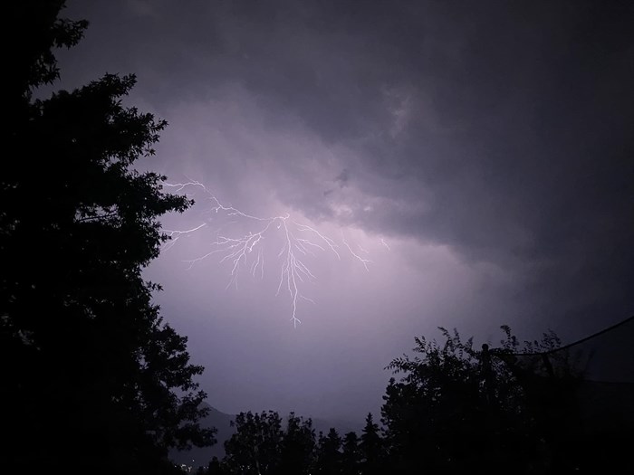 Forks of lightning light up the stormy night sky over Kamloops. 