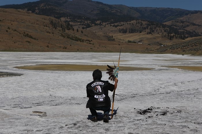 Chief Clarence Louie of Osoyoos Indian Band stands in kllilx’w (Spotted Lake) following the opening ceremony of the nation’s annual general assembly and Youth leadership summit in sw?iw?s (Osoyoos) in syilx Okanagan homelands on July 24, 2024.