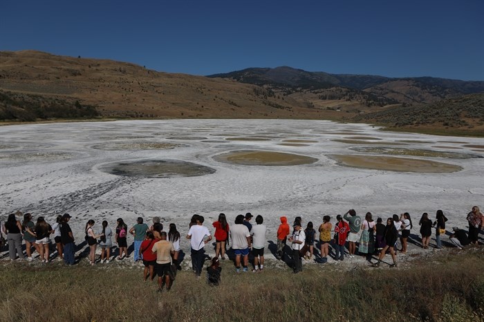 Youth from across the nation lined the outer rim of kllilx’w (Spotted Lake) during the opening ceremony of the nation’s annual general assembly and Youth leadership summit in sw?iw?s (Osoyoos) in syilx Okanagan homelands on July 24, 2024. 