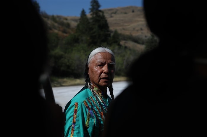 syilx Elder c?qcqalx?qn Arnie Baptist speaks during the opening ceremony of the nation’s annual general assembly and Youth leadership summit at kllilx’w (Spotted Lake) in sw?iw?s (Osoyoos) in syilx Okanagan homelands on July 24, 2024.