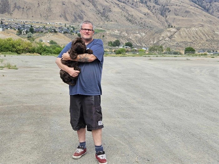 Kamloops resident Trevor Starchuk stands on a parcel of land at 1740 Kelly Douglas Road in Kamloops. 