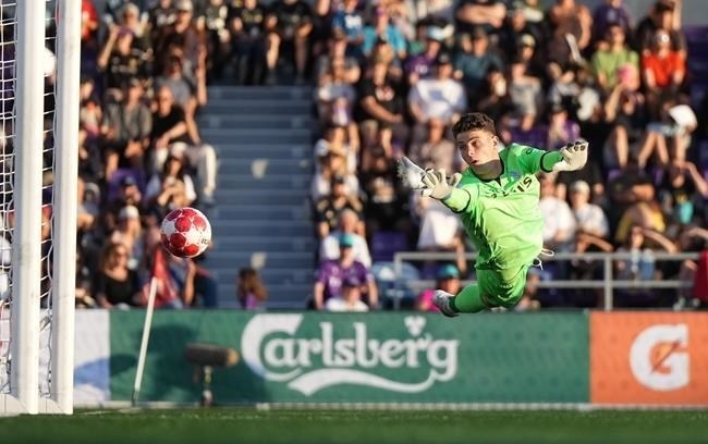 Pacific FC goalkeeper Emil Gazdov allows a goal to Vancouver Whitecaps' Ryan Gauld, not seen, during the second half of a Canadian Championship semifinal soccer match, in Langford, B.C., on July 10, 2024.