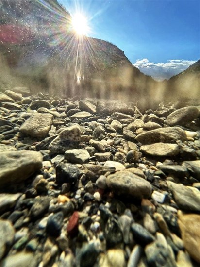 The sun shines through the surface of Pavilion Lake west of Kamloops. 