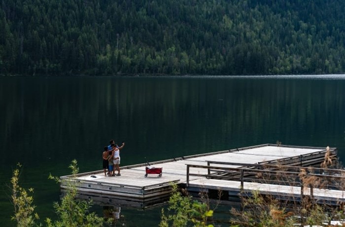 A group takes a selfie on a dock at Paul Lake, a community near Kamloops. 