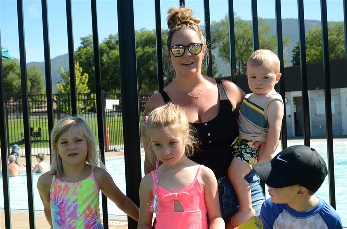 Lindsay Zachary with four ofher five children. She's like to see the pool so her kids could go after school.