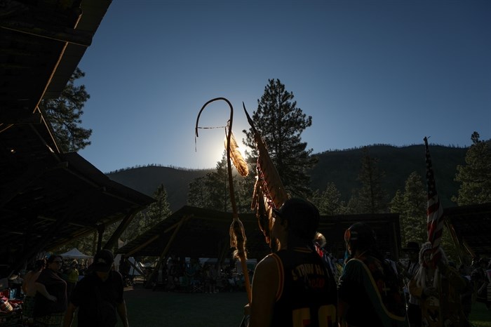 Eagle staff and flag carriers line up for the afternoon grand exit on the second day of the 2024 Similkameen Powwow of Champions on Aug. 31.