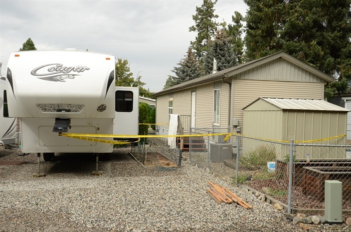 Police tape off the trailer.