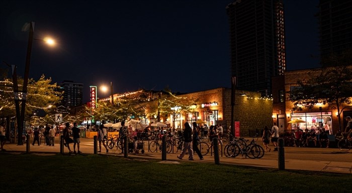 The streets of Kelowna are alive just after sunset in early September. 