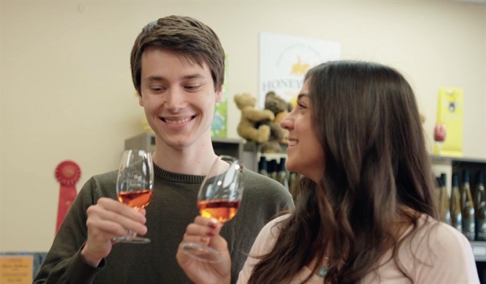 James and Alexandra Nowek at Plant Bee in Vernon raise a glass of their product.